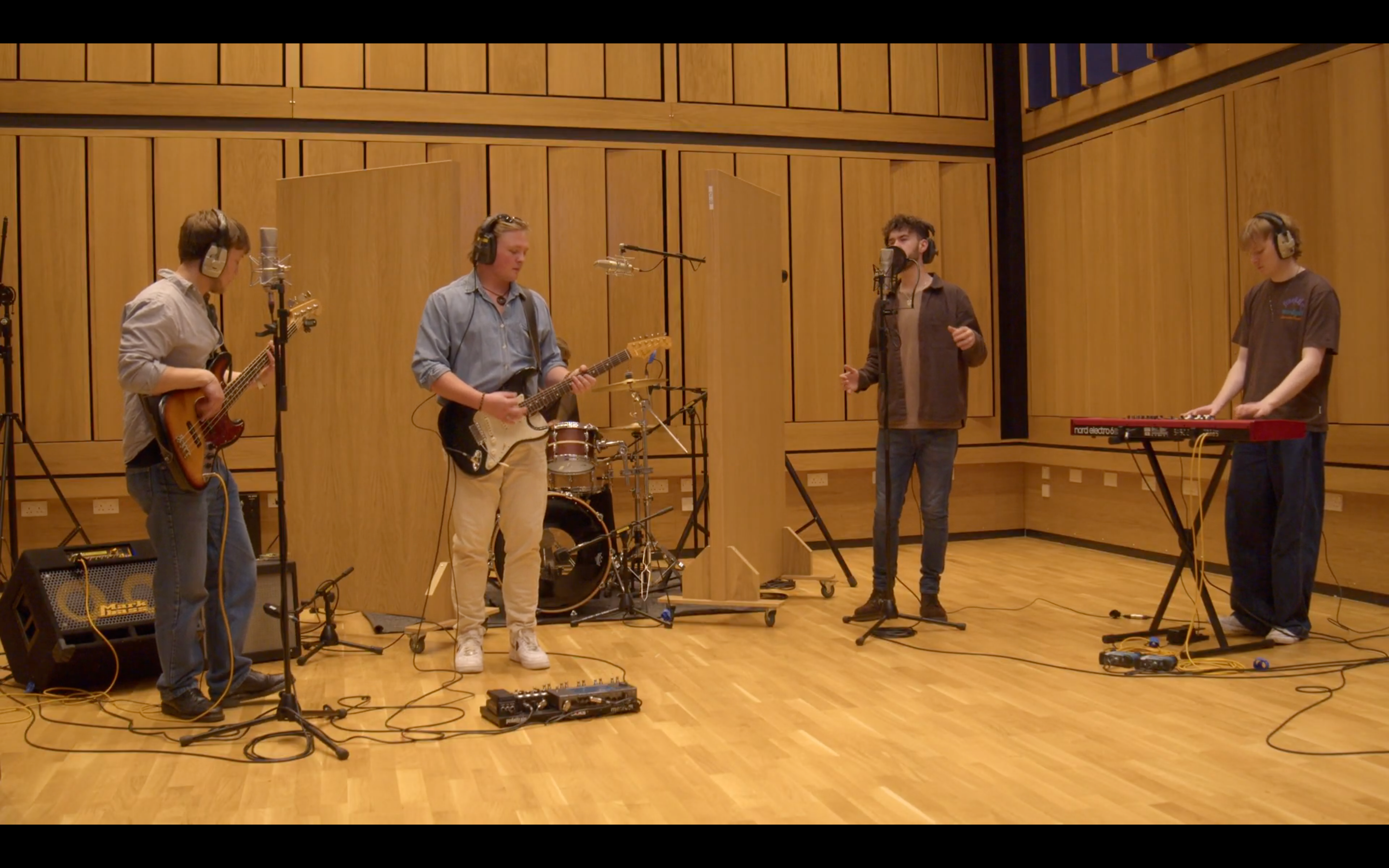 Musicians playing in a studio